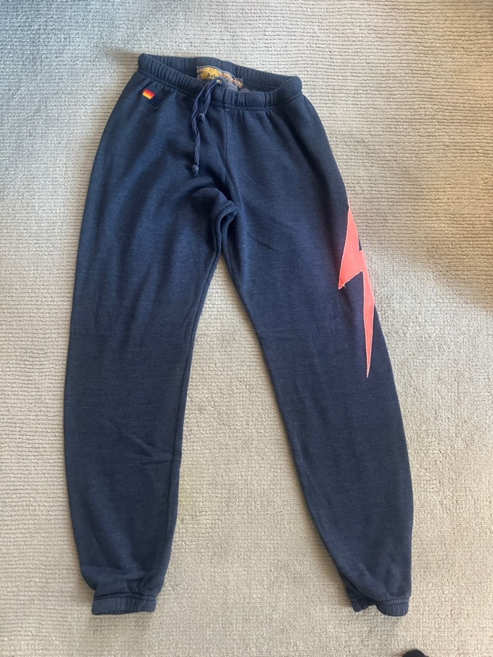 Aviator Nation Navy Track Joggers with Pink Lightning Bolt